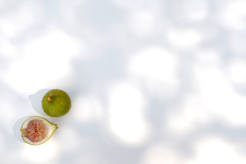 green and white round fruits