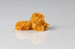 brown popcorn on white surface