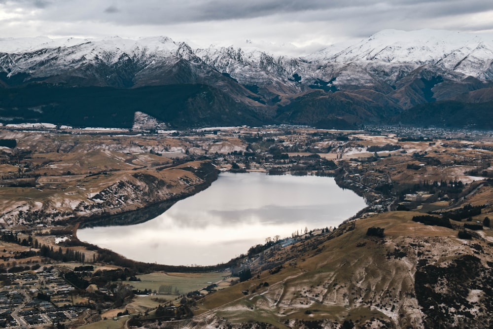 lake in the middle of mountains