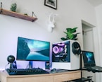 black flat screen tv on brown wooden tv rack