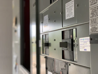 Close-up of a water pump control panel with magnetic switches installed.