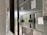 A close-up view of an industrial electrical panel with various switches and labels. The focus is on the switches, with the labels providing details about their use and installation instructions. The panel is metallic and has a utilitarian design.