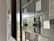 A close-up view of an industrial electrical panel with various switches and labels. The focus is on the switches, with the labels providing details about their use and installation instructions. The panel is metallic and has a utilitarian design.