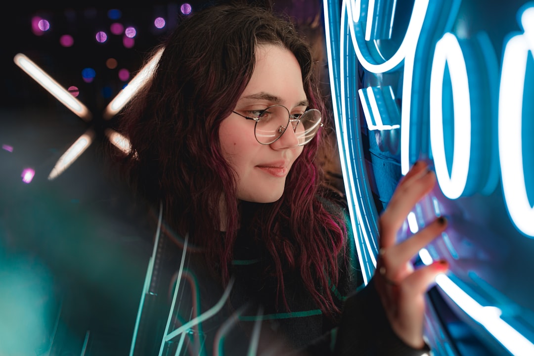 woman in black framed eyeglasses