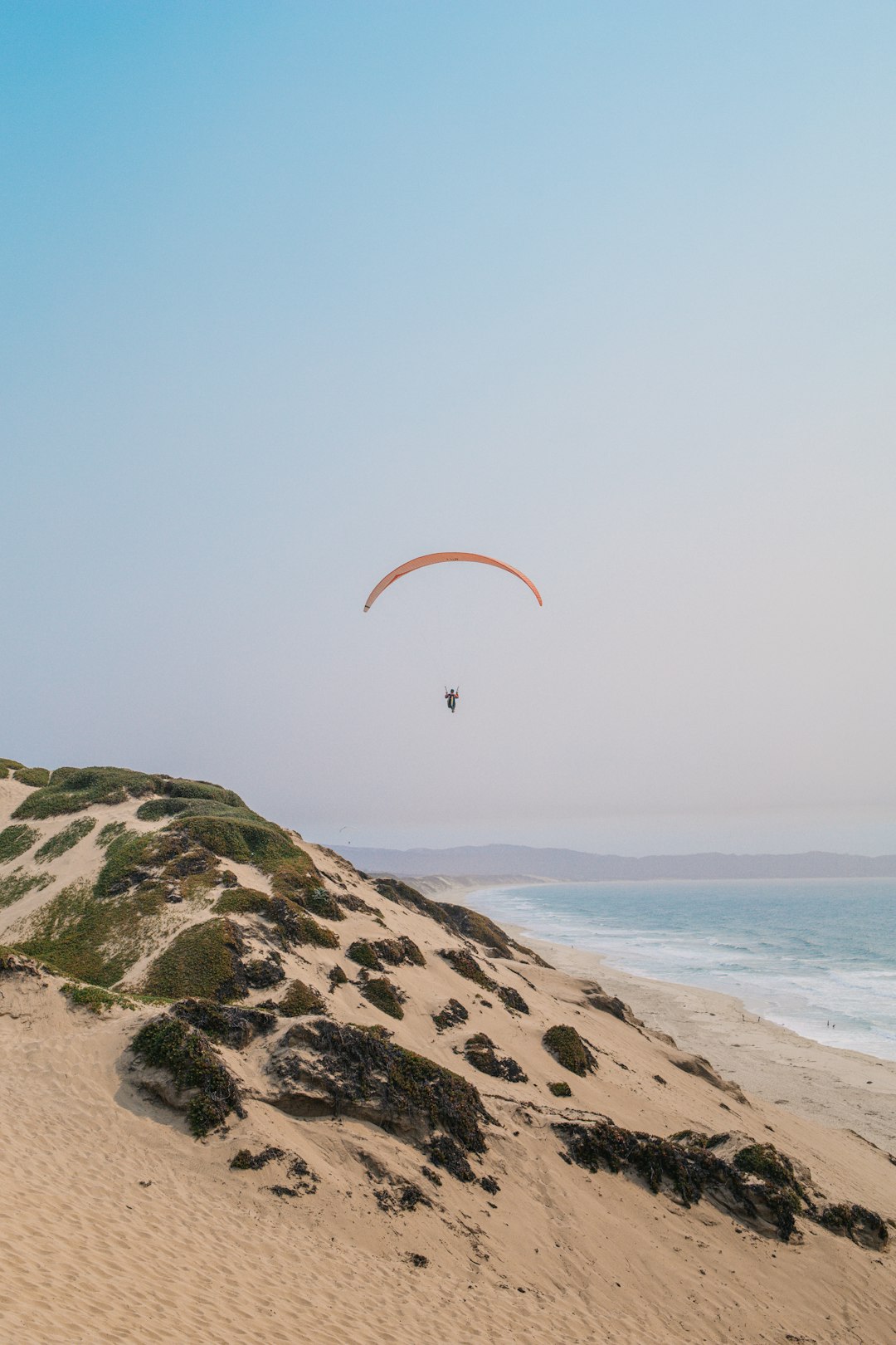 person surfing on sea during daytime