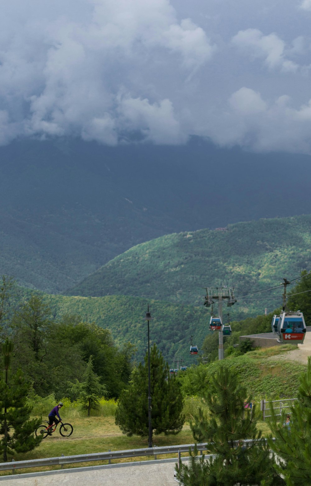 green mountain under white clouds during daytime