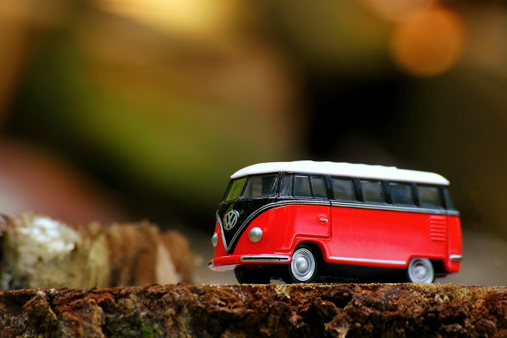 red and white volkswagen t-2 scale model