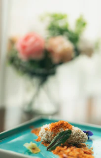 Close-up of a gourmet dish with tropical ingredients on a white plate