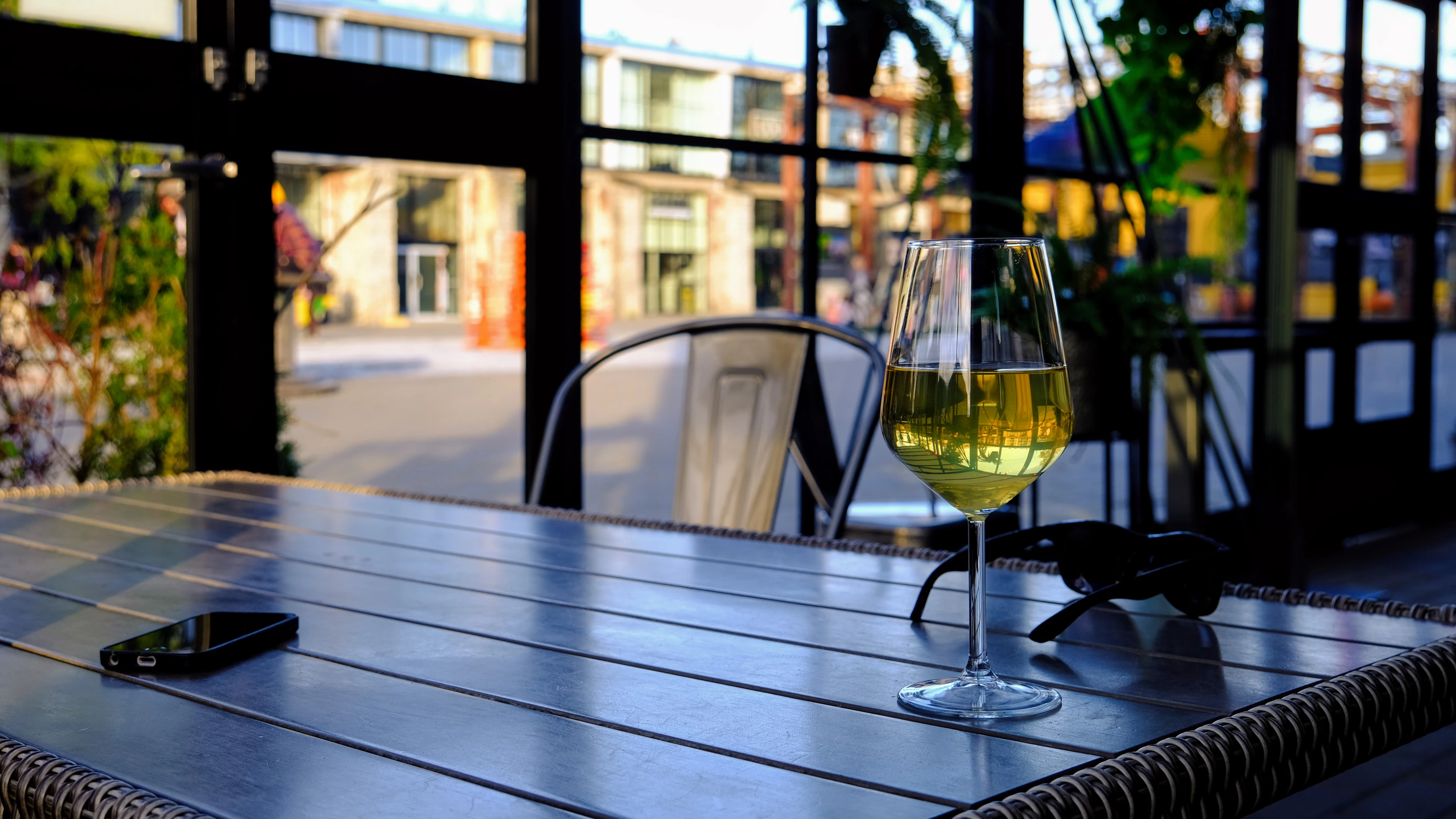Wine glass on a restaurant table — evening dining