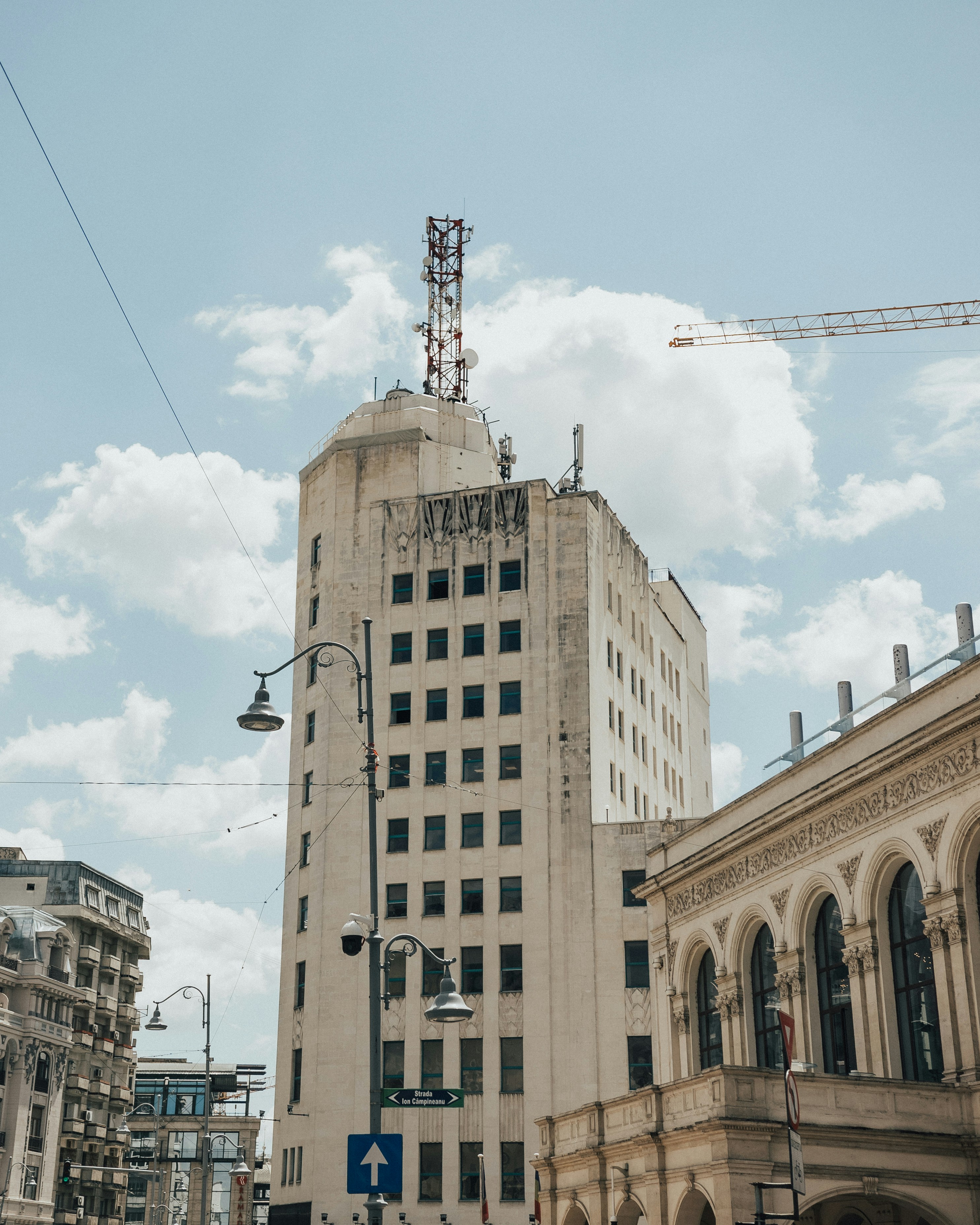 brown concrete building under blue sky during daytime