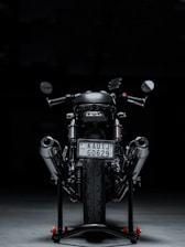 black motorcycle with black background