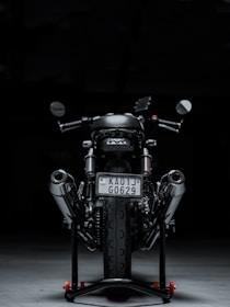 black motorcycle with black background