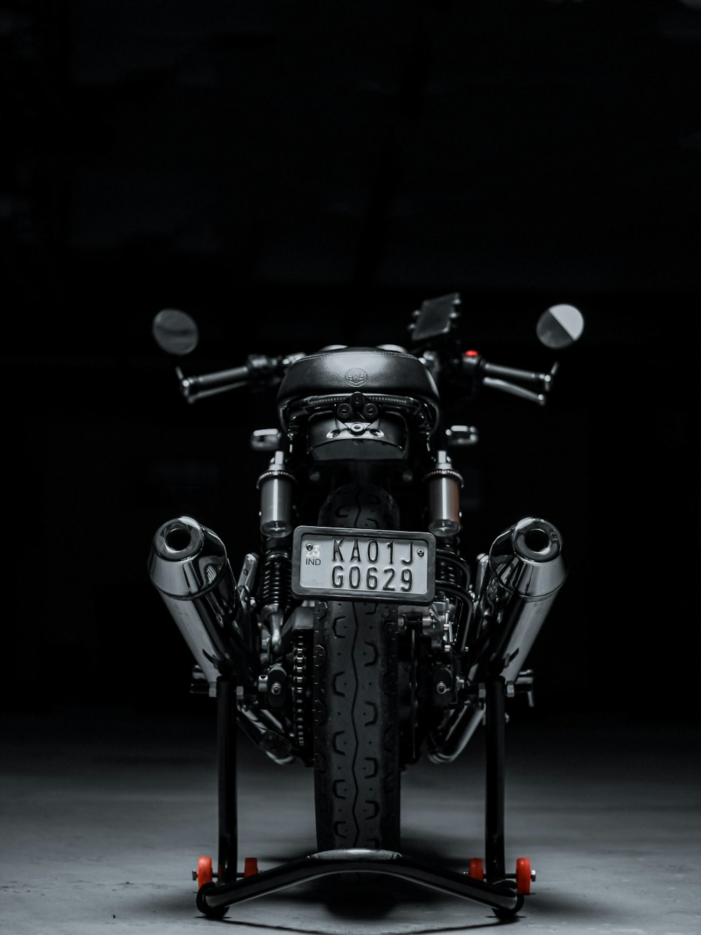black motorcycle with black background