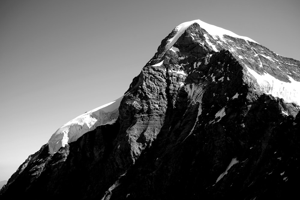 snow covered mountain during daytime