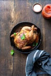 chicken on black round plate