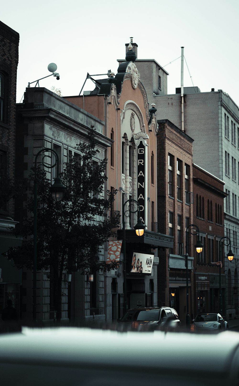 brown and white concrete building during daytime