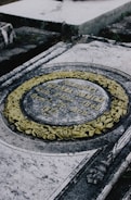 A beautifully crafted marble gravestone showcasing intricate designs.
