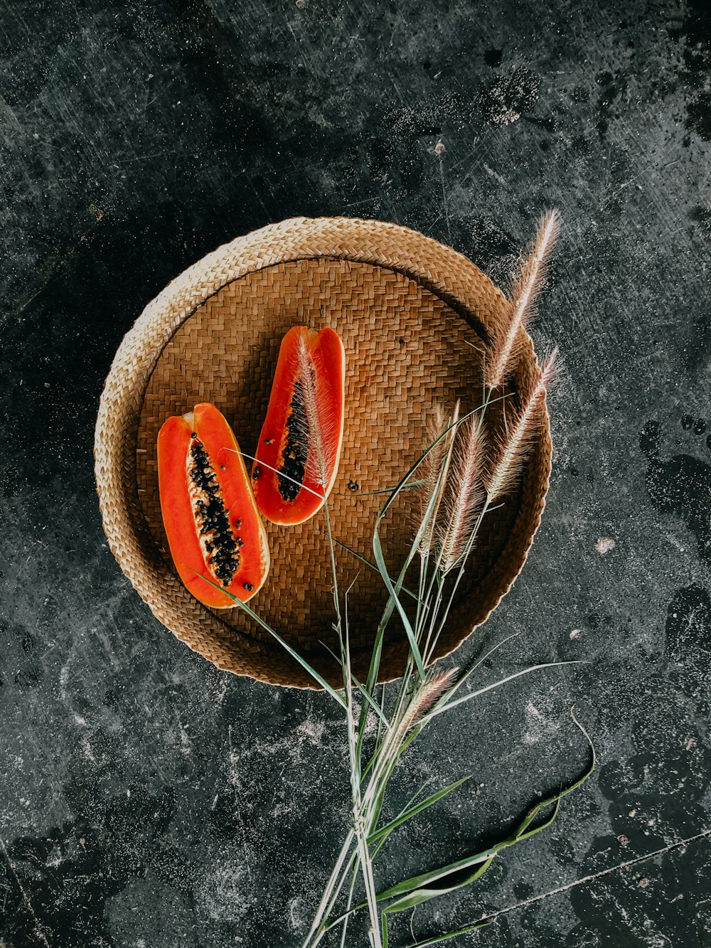 orange carrots on brown woven round basket