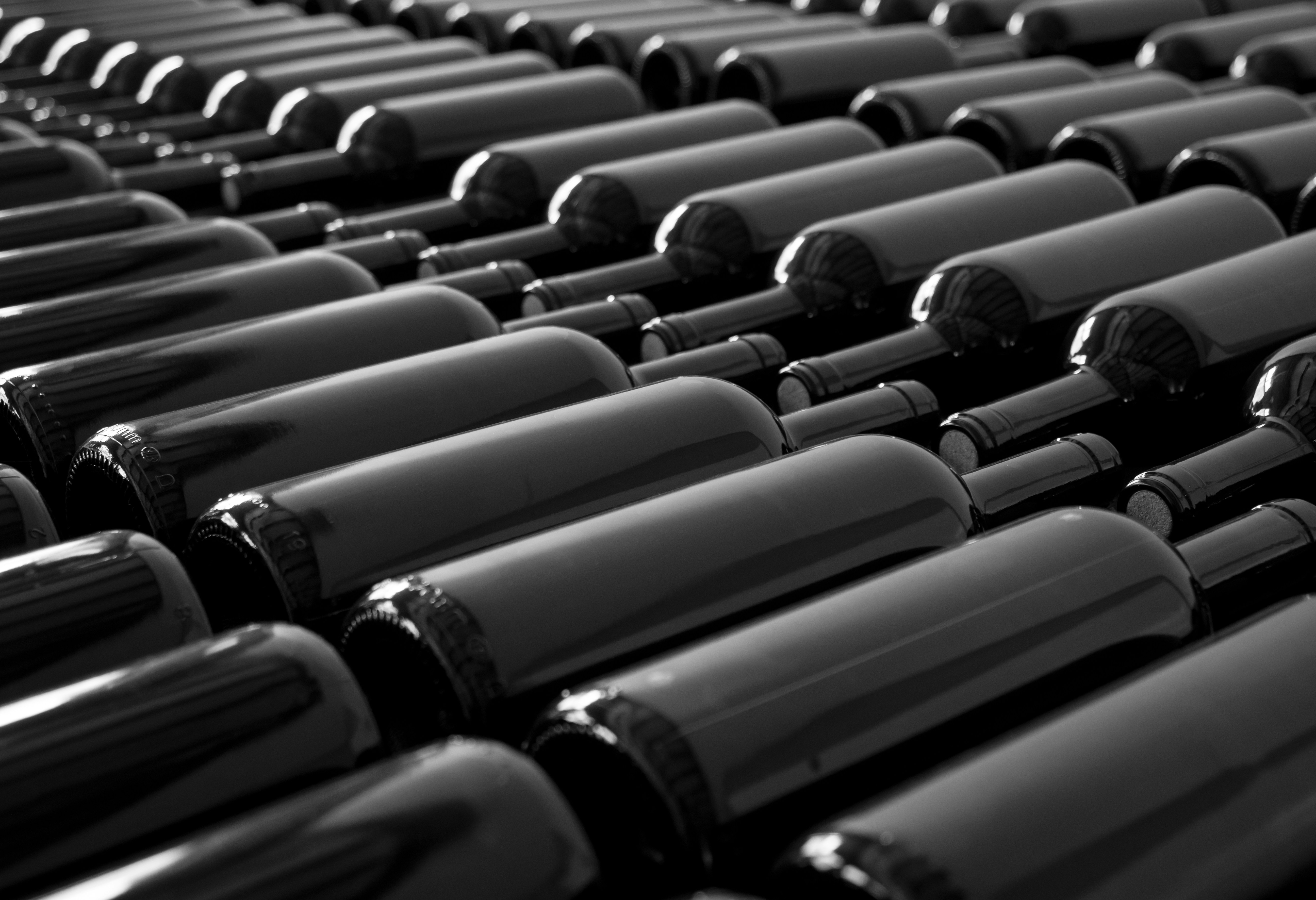 black and white bottles on black and white surface, 