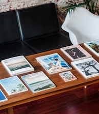 magazines on brown wooden table