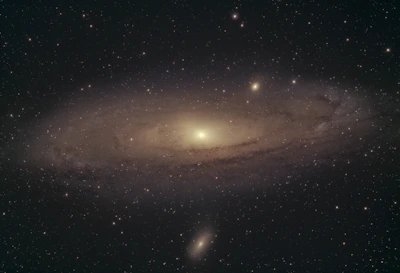A breathtaking view of a spiral galaxy glowing with vibrant blues and purples against the dark cosmos.