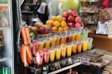 A colorful display of assorted fruit juices and specialty drinks ready for shipment.