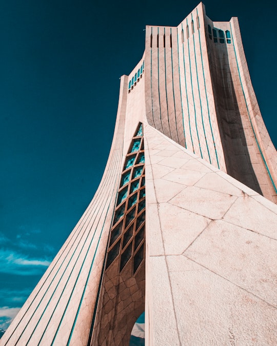 gray concrete building under blue sky during daytime in Azadi Tower Iran