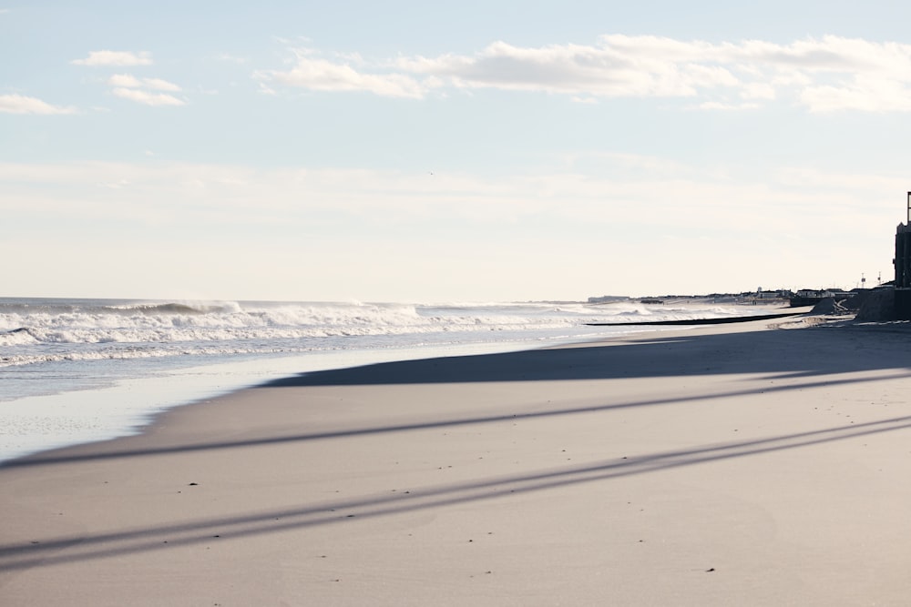 white sand beach during daytime