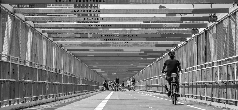 grayscale photo of people walking on street