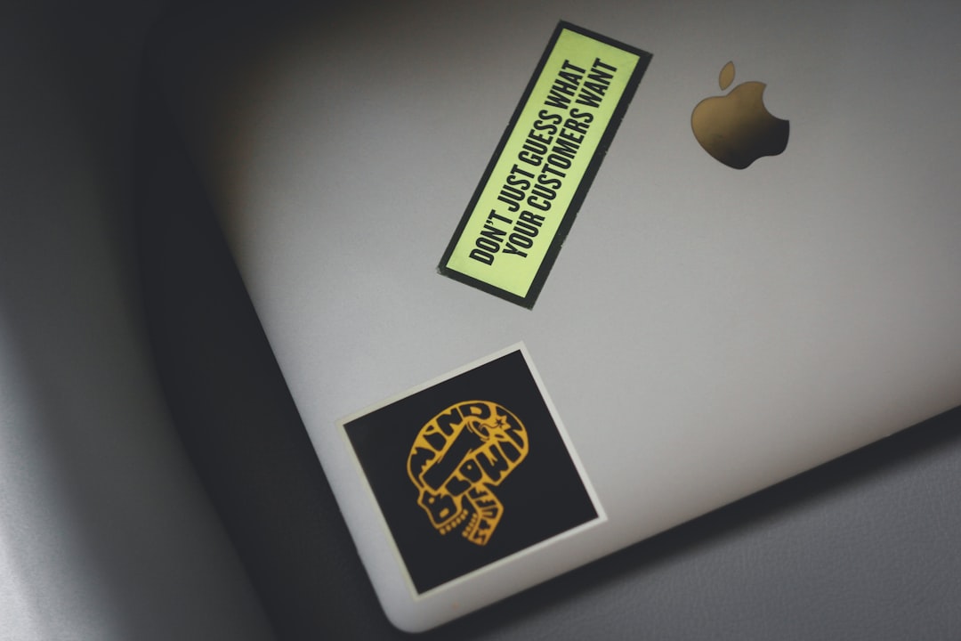 macbook pro with yellow and black sticker, Don
