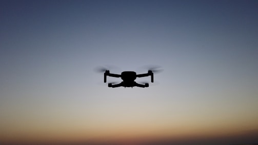 Drone preparing for a simulated defence training exercise at dawn.