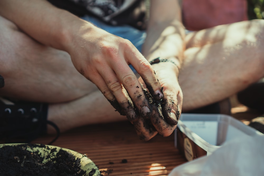 person with black nail polish