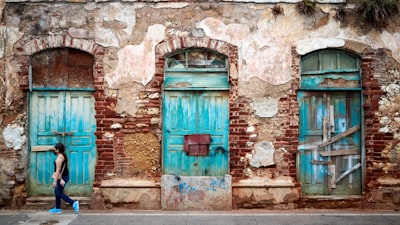 red wooden door on gray concrete wall colonial google meet background