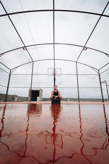Athlete wearing lightweight, breathable knee and elbow supports during a basketball game.
