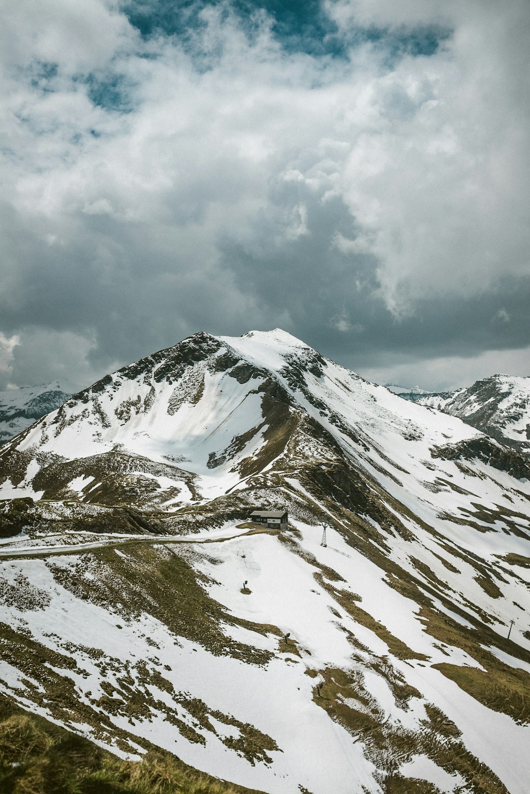 snow covered mountain under blue sky during daytime