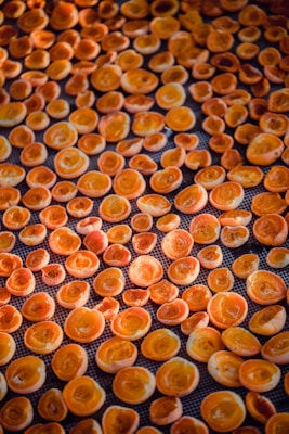 brown and black round fruits