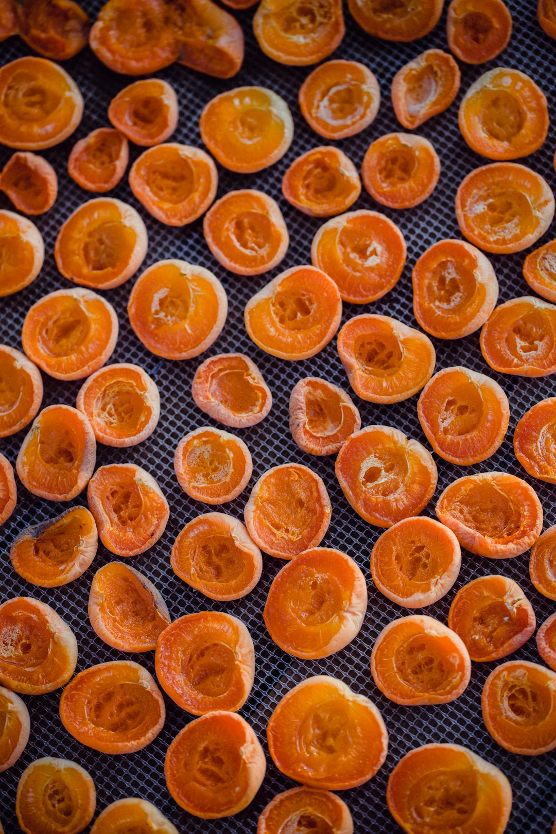 orange fruits on brown wooden table