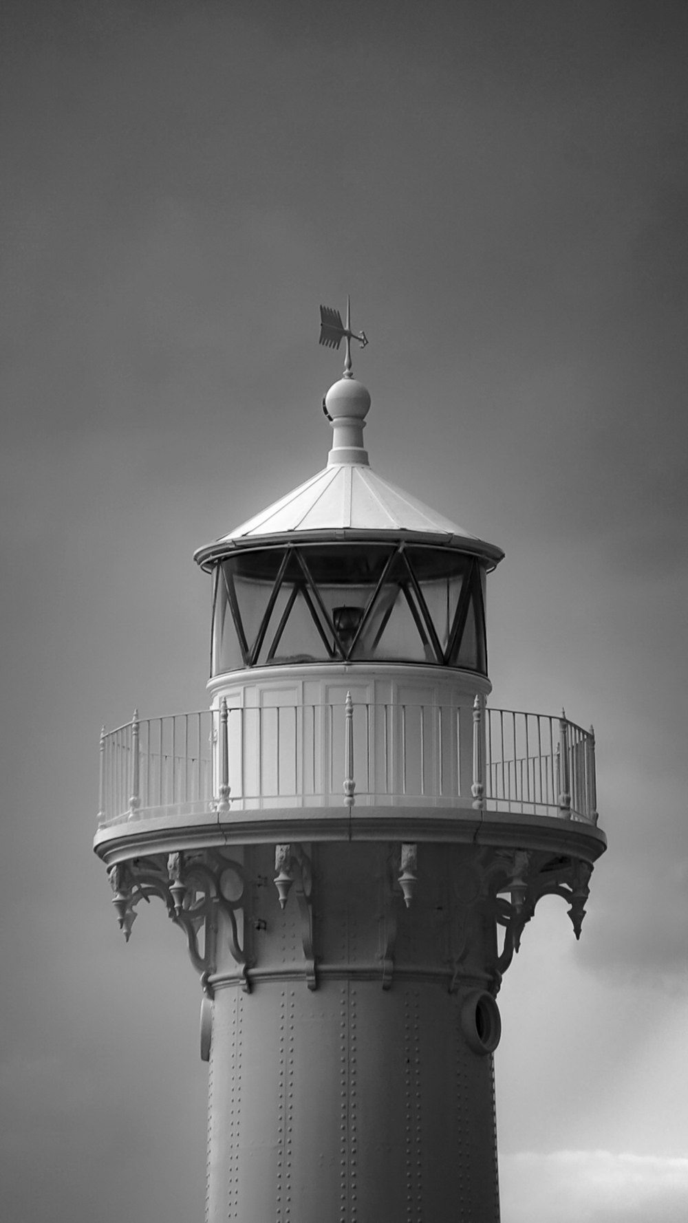 grayscale photo of a white and black tower