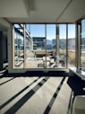 white and brown wooden framed glass window