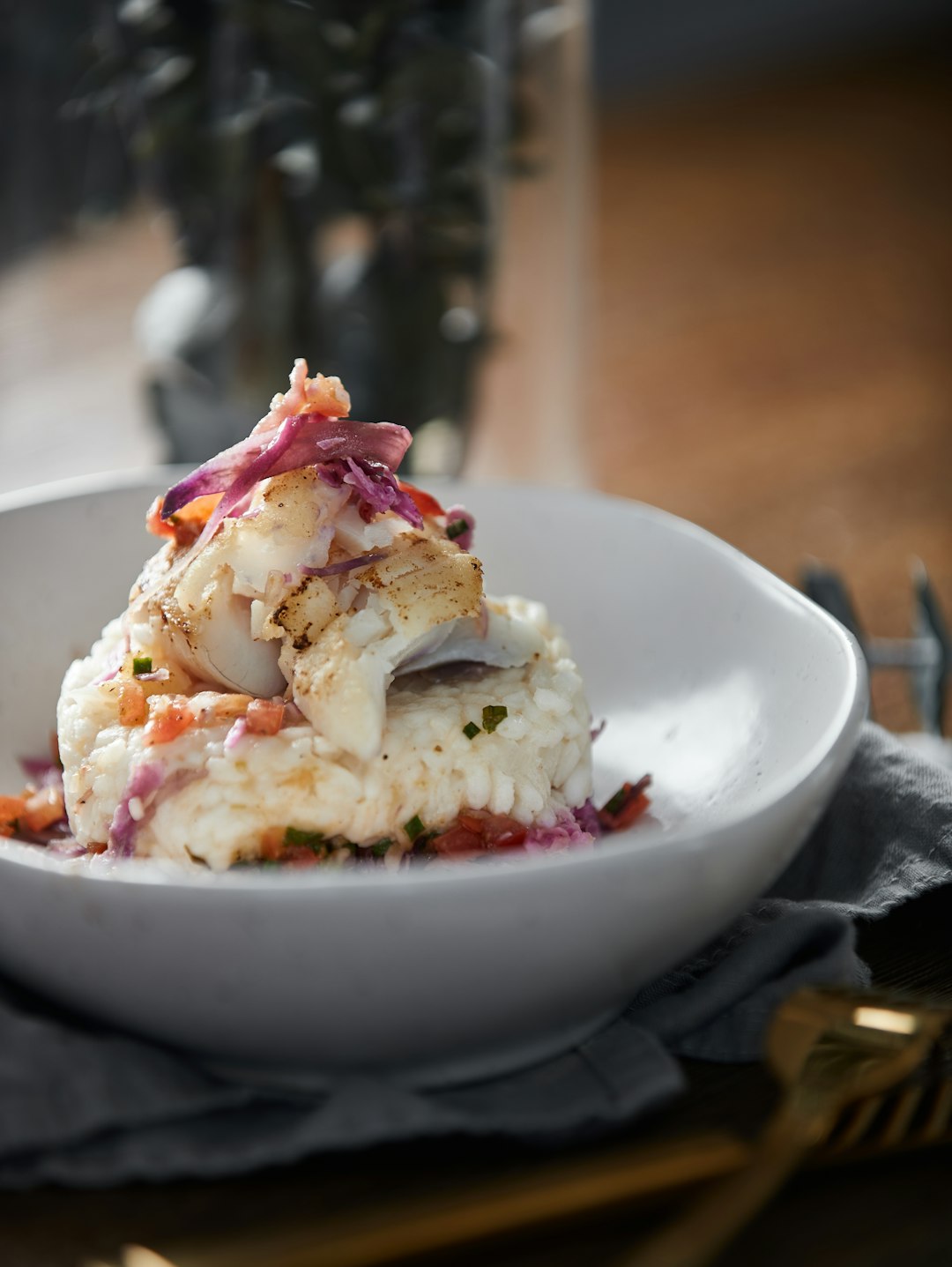 white and pink ice cream on white ceramic bowl