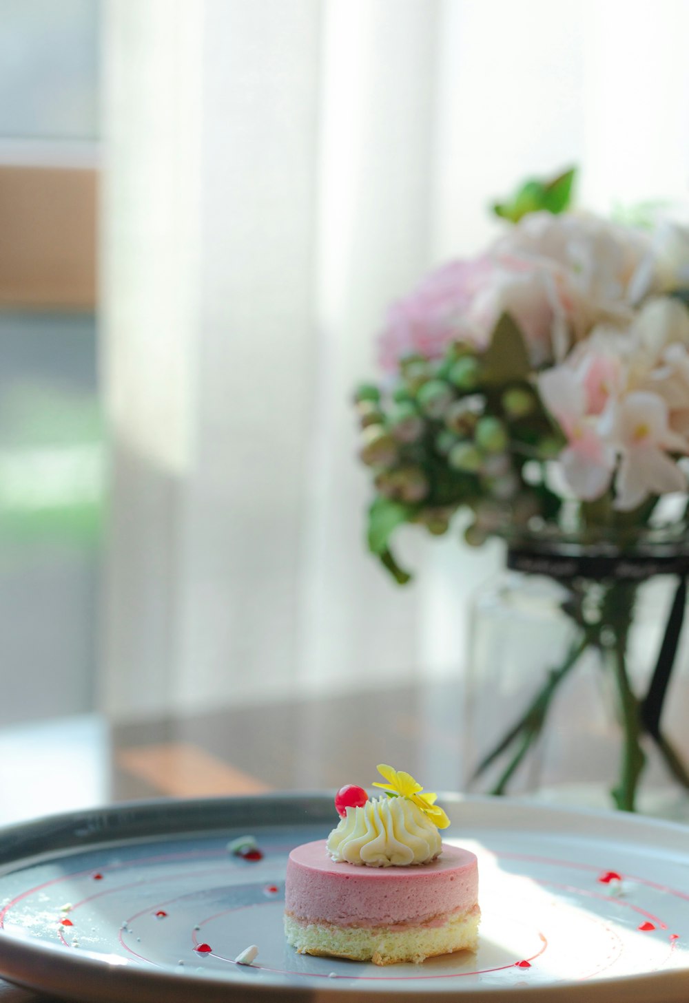 pink and white flowers on table