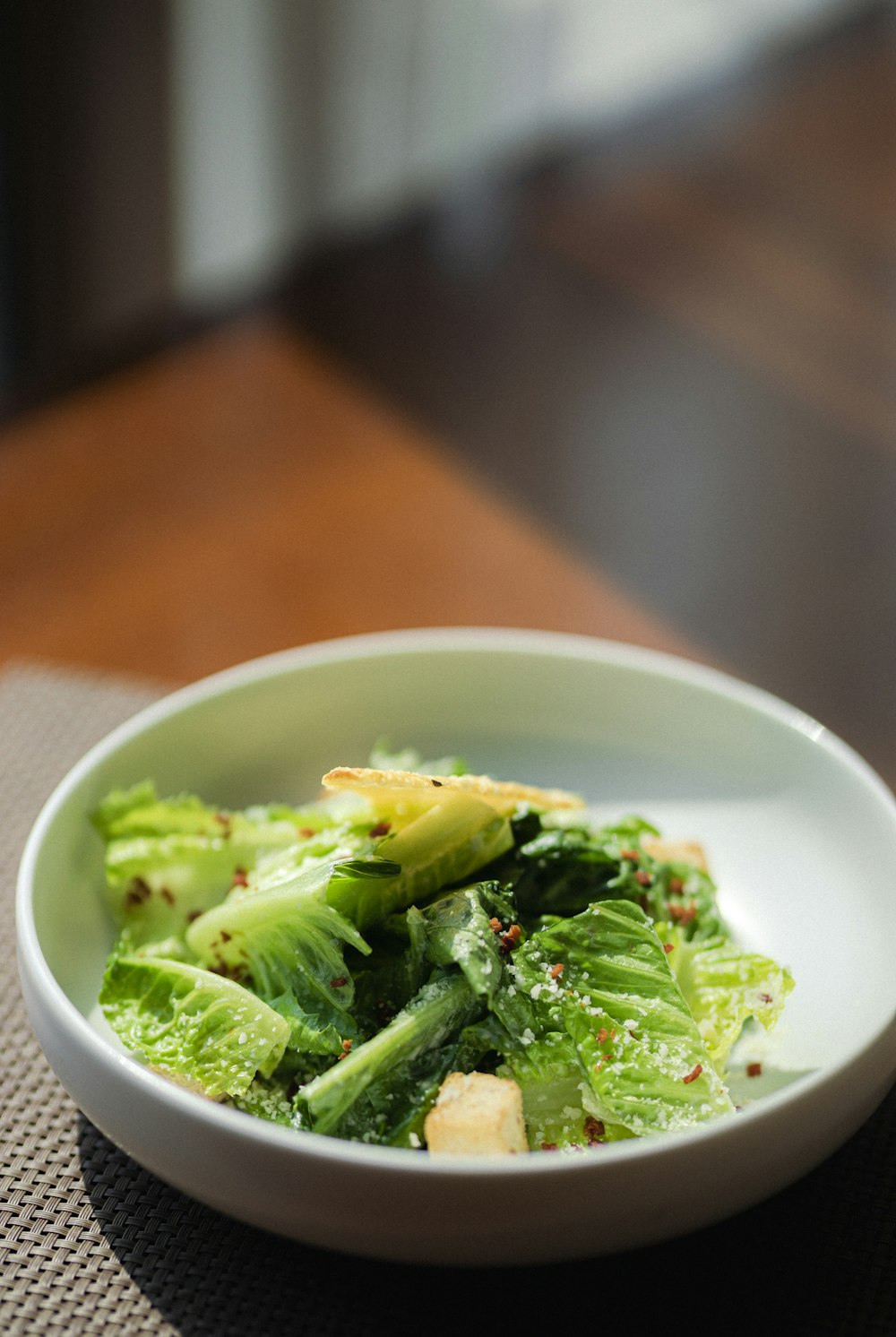 green vegetable on white ceramic bowl