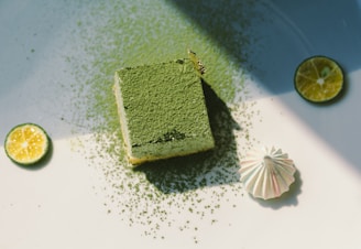green and white cake on white ceramic plate