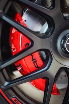 gray and red car wheel