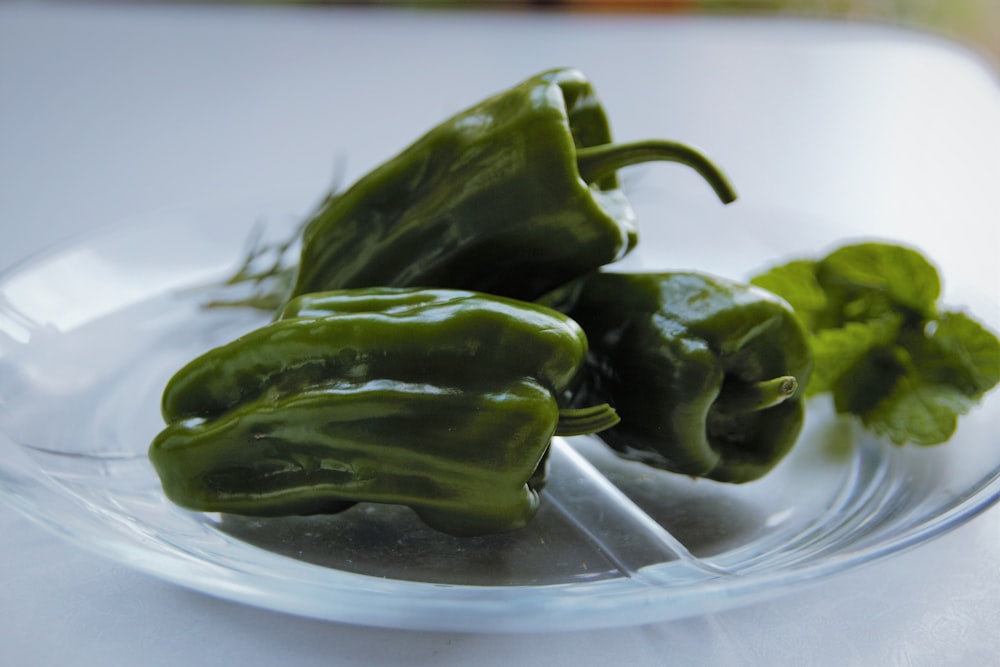 green bell pepper on clear glass bowl