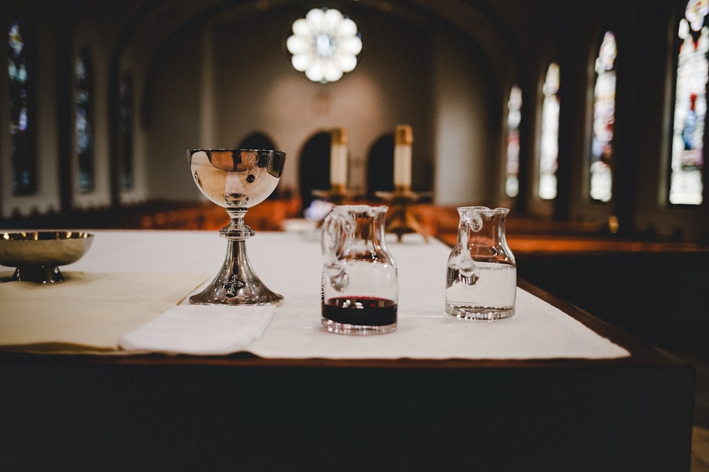 clear glass bottle on table