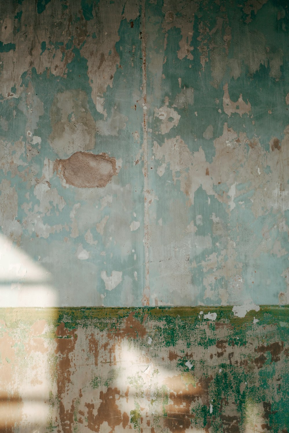 green and white concrete wall