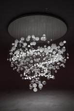 white and silver round pendant lamp