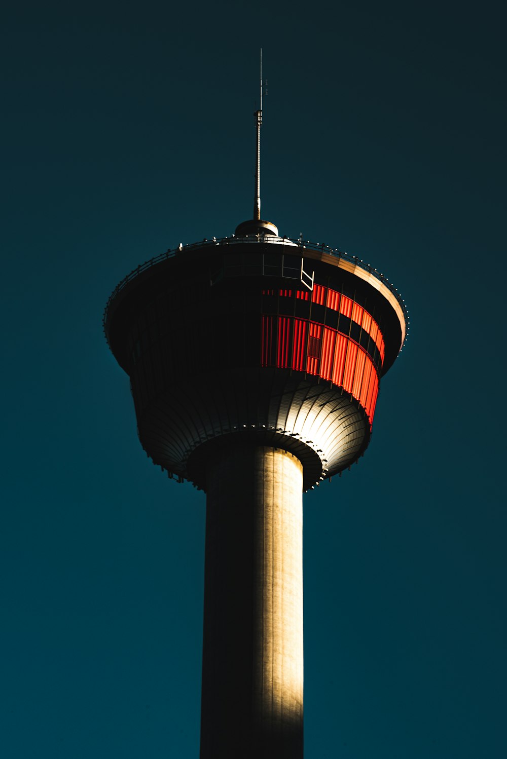 red and white tower under blue sky during daytime