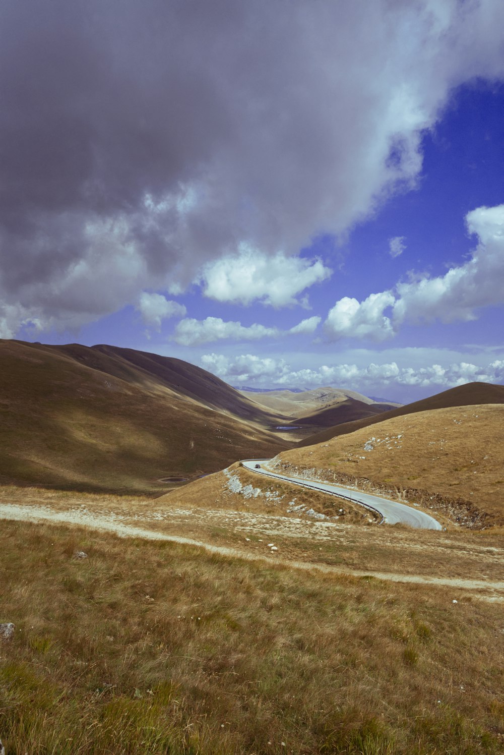 green and brown mountains under blue sky during daytime